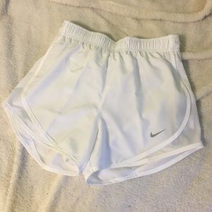 White Nike shorts